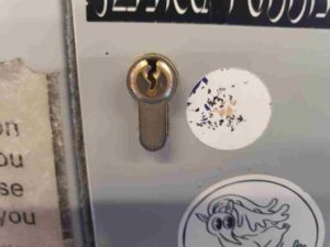 gold key lock in door installed after security survey